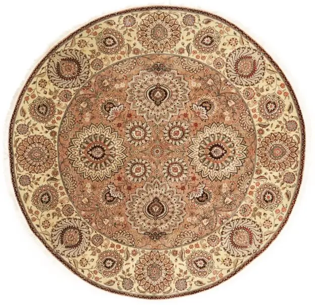 A circular rug with a pattern  Description automatically generated