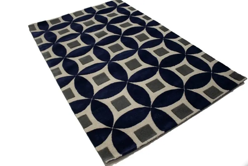 A rug with a pattern on it  Description automatically generated