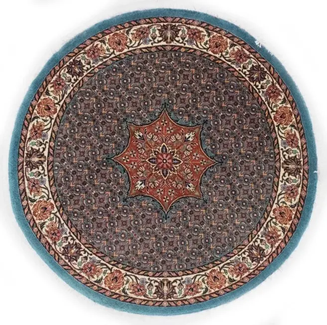 A circular rug with a design on it  Description automatically generated