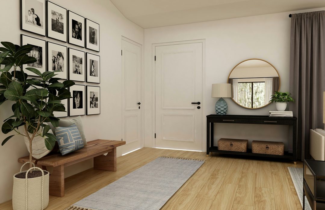 An entryway with a rug by the front door